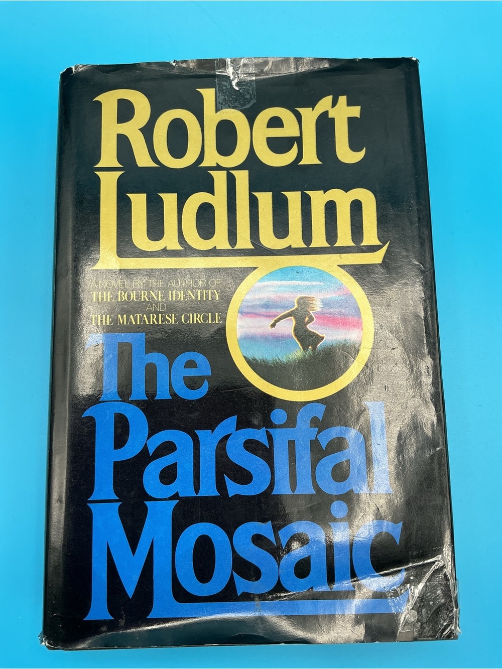 Robert Ludlum "The Parsifal Mosaic" Hardcover Book - Black & Blue